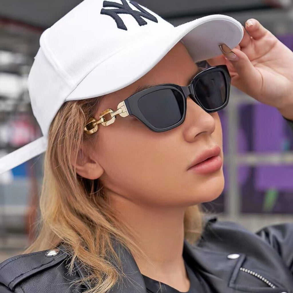 Schwarz-goldene Vintage Cat-Eye-Sonnenbrille