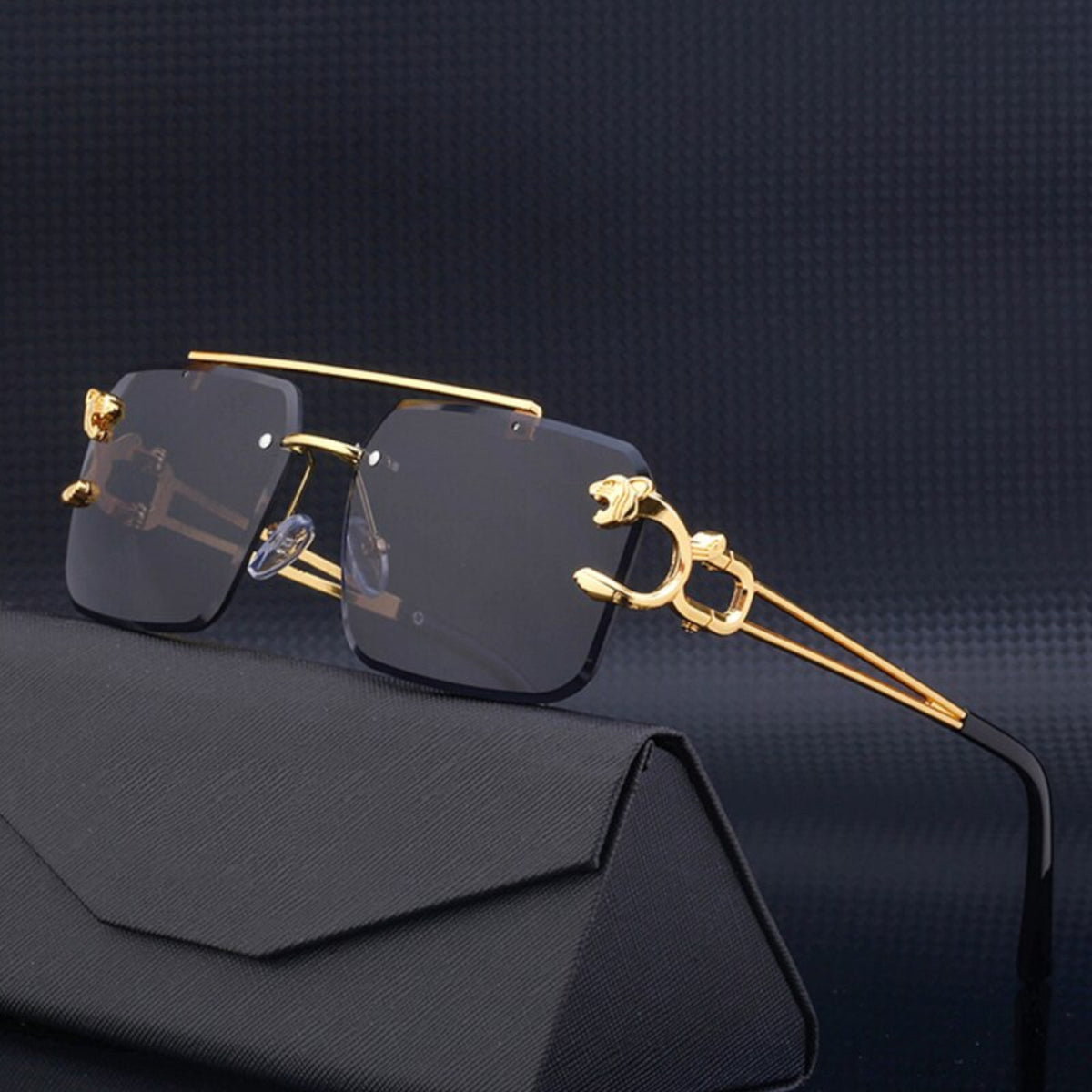 Schwarz-goldene Vintage Designer-Sonnenbrille