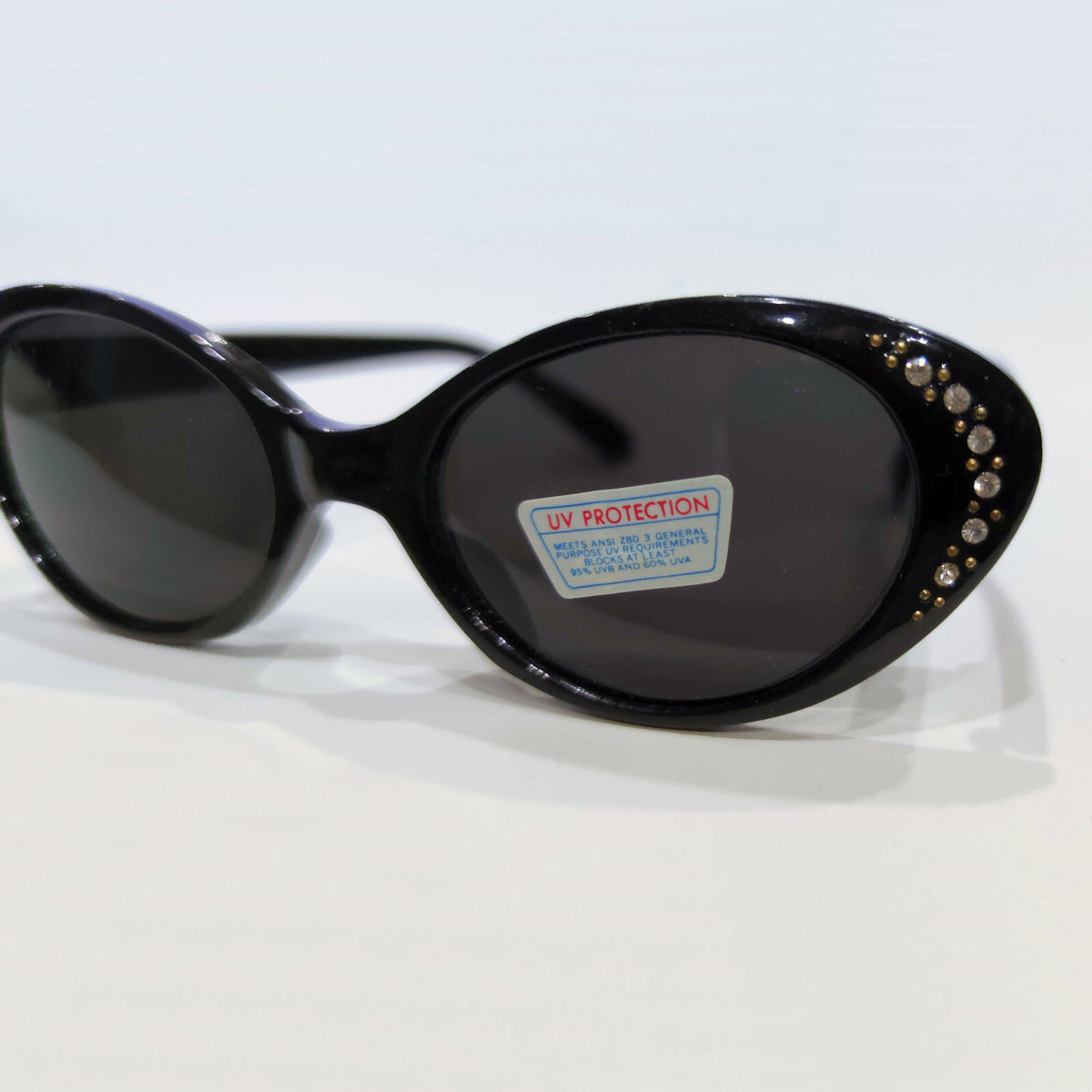 Schwarze Cat-Eye-Sonnenbrille mit Strass