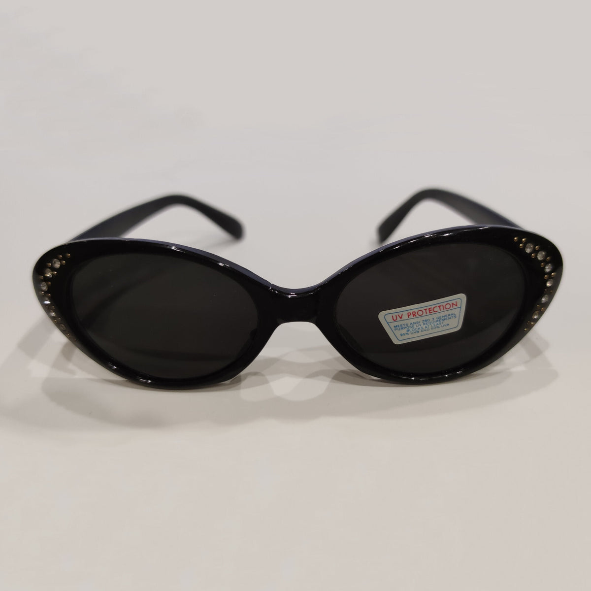 Schwarze Cat-Eye-Sonnenbrille mit Strass
