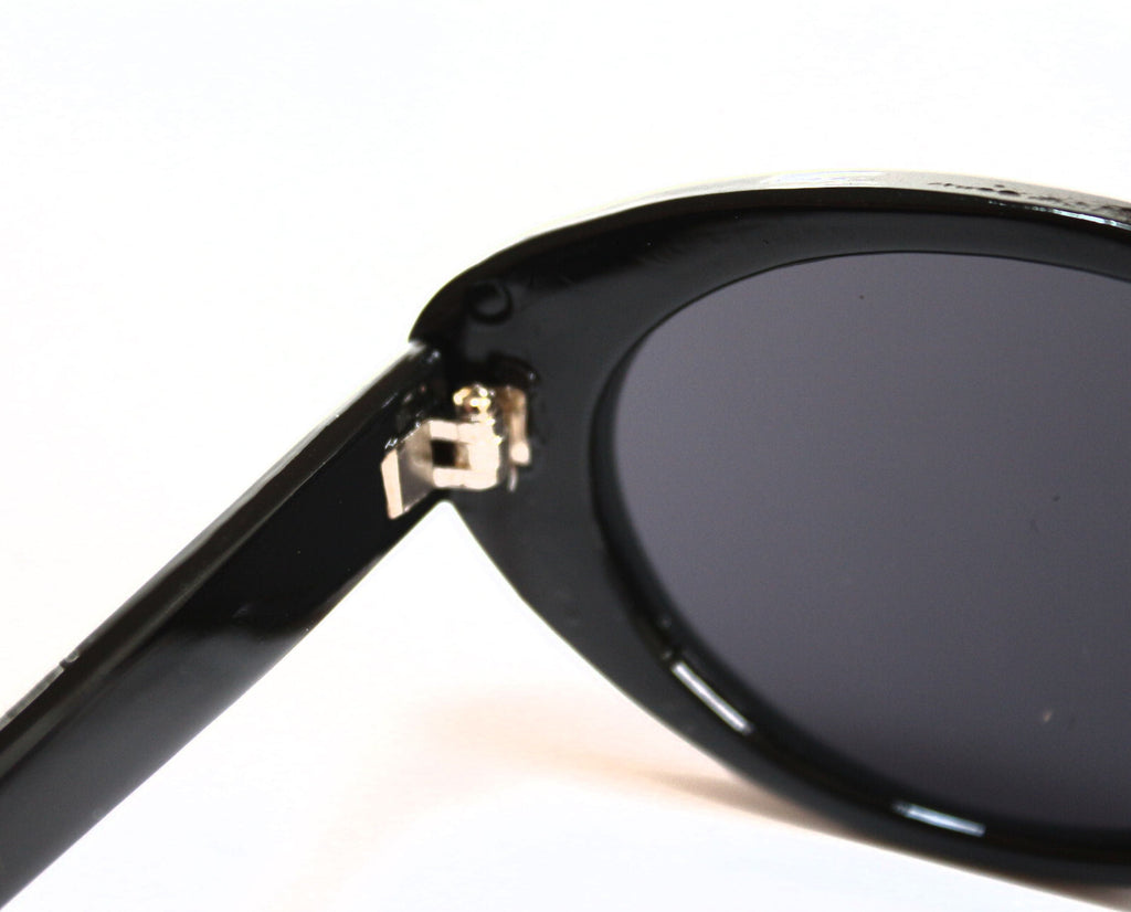 Schwarze Cat-Eye-Sonnenbrille mit Strass