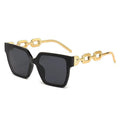 Oversized Cat-Eye-Sonnenbrille Schwarz-Gold