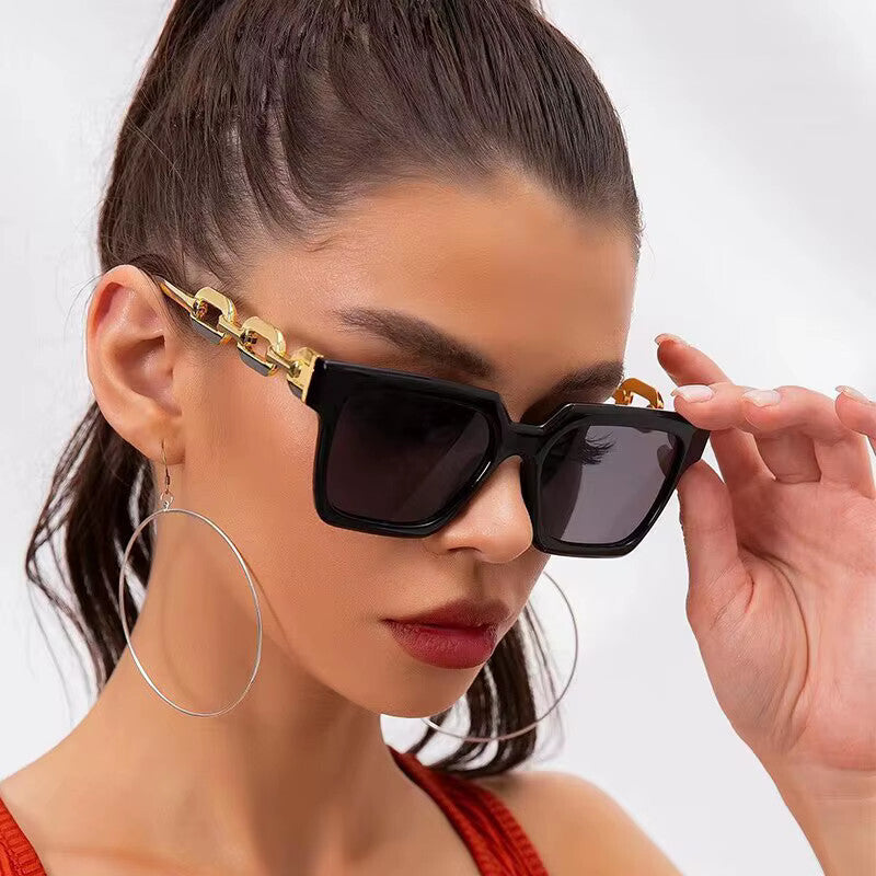 Oversized Cat-Eye-Sonnenbrille Schwarz-Gold