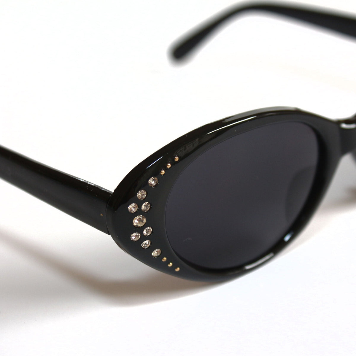 Schwarze Cat-Eye-Sonnenbrille mit Strass
