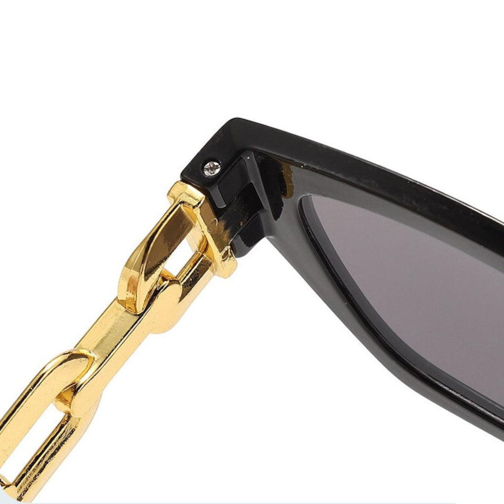 Schwarz-goldene Vintage Cat-Eye-Sonnenbrille