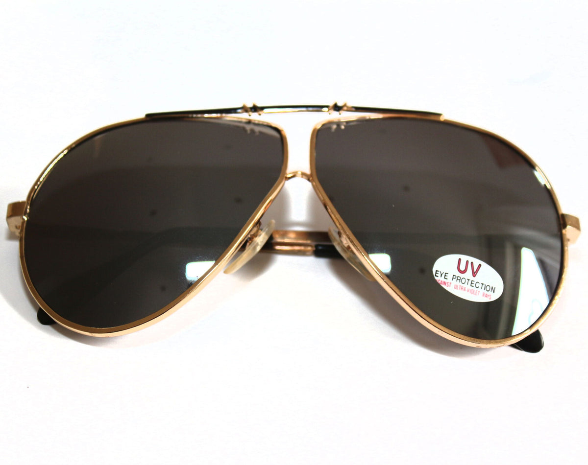 Gold-schwarze Piloten-Sonnenbrille im Porsche-Stil